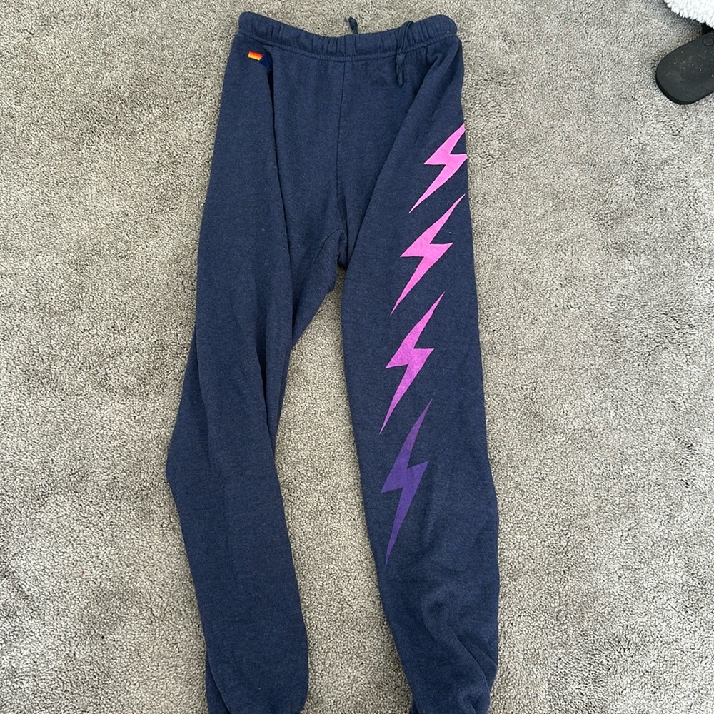 Aviator nation sweatpants lightning bolts on left leg